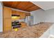 Well-equipped kitchen with stainless-steel appliances, wood ceiling and stylish fixtures at 510 Cranes Way # 306, Altamonte Springs, FL 32701