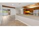 Cozy kitchen with stainless steel appliances, wood cabinets, and an adjacent dining area at 510 Cranes Way # 306, Altamonte Springs, FL 32701