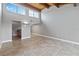 Bright living room featuring a high wood ceiling, tile floors, and open floorplan to the kitchen, great for entertaining at 510 Cranes Way # 306, Altamonte Springs, FL 32701