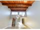 Inviting living room with vaulted ceiling and exposed wood beams at 510 Cranes Way # 306, Altamonte Springs, FL 32701