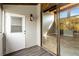 Enclosed porch with tile floors, and sliding glass doors leading to sunroom at 510 Cranes Way # 306, Altamonte Springs, FL 32701