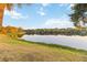 Serene water view with lush green grass in this waterfront community at 510 Cranes Way # 306, Altamonte Springs, FL 32701
