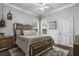 Bright bedroom features a mirrored bed frame, neutral color palette, and ample natural light at 6009 Lady Bet Dr, Orlando, FL 32819
