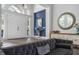 Elegant foyer with high ceilings, a textured blue wall, and an inviting entrance with double doors at 6009 Lady Bet Dr, Orlando, FL 32819