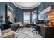 Elegant office features custom millwork, bay window, and modern furnishings creating a luxurious workspace at 6009 Lady Bet Dr, Orlando, FL 32819