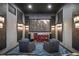 Home theater with plush seating, movie screen, and custom lighting for immersive entertainment at 6009 Lady Bet Dr, Orlando, FL 32819