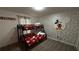 Mickey Mouse themed bedroom with bunk beds at 988 Leader St, Davenport, FL 33896