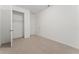 Neutral bedroom with a closet and carpeted flooring for a comfortable feel at 15542 Sunquat Dr, Winter Garden, FL 34787