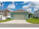 Charming single-Gathering home with a two-car garage, manicured lawn, and appealing curb appeal at 15542 Sunquat Dr, Winter Garden, FL 34787