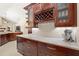 Kitchen with stainless appliances, wine rack, and granite countertops at 807 Grovesmere Loop, Ocoee, FL 34761