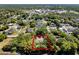 Expansive aerial view highlighting the property lines and surrounding area, showcasing lush greenery and neighborhood at 347 Mission Rd, Oviedo, FL 32765