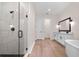 Bathroom featuring glass shower and double sink vanity at 347 Mission Rd, Oviedo, FL 32765