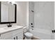Bathroom featuring a vanity with a white countertop and a shower over tub combination at 347 Mission Rd, Oviedo, FL 32765