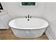 Close-up of a freestanding tub with modern fixtures, creating a spa-like atmosphere at 347 Mission Rd, Oviedo, FL 32765