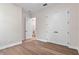 Bedroom with an opening to the walk-in closet and a set of double doors at 347 Mission Rd, Oviedo, FL 32765