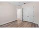 Bedroom with wood floors, ceiling fan and closet space at 347 Mission Rd, Oviedo, FL 32765