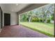 Brick patio area overlooking a beautiful, expansive backyard at 347 Mission Rd, Oviedo, FL 32765