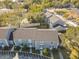 Aerial view of townhouses, showing building layout and landscaping at 4408 Sun Village Blvd, Kissimmee, FL 34746