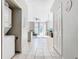 Hallway features tile flooring and access to living spaces and bedrooms at 4408 Sun Village Blvd, Kissimmee, FL 34746