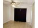 Bedroom with neutral walls, tile flooring, and a ceiling fan, ready for personalization at 849 Orange Oak Dr, Orange City, FL 32763