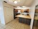 Functional kitchen with stainless steel appliances, cabinets, island and a door leading to outside at 849 Orange Oak Dr, Orange City, FL 32763