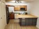 Well-organized kitchen featuring stainless steel appliances, light wood cabinetry, and butcher block island at 849 Orange Oak Dr, Orange City, FL 32763