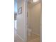 Small half bathroom with toilet and tiled floor at 8490 Se 110Th Street Rd, Belleview, FL 34420