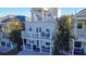 Three stories of balconies with white railings offer outdoor living and views at 7405 Excitement Dr, Kissimmee, FL 34747