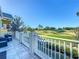 Charming balcony provides picturesque views of the beautifully landscaped golf course, perfect for relaxing at 7405 Excitement Dr, Kissimmee, FL 34747
