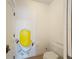 Powder room with Minion cartoon wall art at 7405 Excitement Dr, Kissimmee, FL 34747