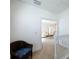 Upper hallway with view of living room at 7405 Excitement Dr, Kissimmee, FL 34747