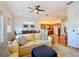 Spacious living area adjacent to the kitchen and dining area features an open concept layout at 7405 Excitement Dr, Kissimmee, FL 34747