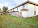 Exterior view of the property, showing the building and landscaping at 1609 Little Falls Cir # 79, Orlando, FL 32807