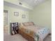Cozy bedroom with palm tree themed bedding and convenient built-in shelving at 5578 Metrowest Blvd # 101, Orlando, FL 32811