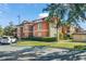 Attractive condominium building with well-maintained landscaping and ample parking at 5578 Metrowest Blvd # 101, Orlando, FL 32811