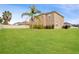 Large backyard with lush lawn and privacy fence at 752 Sandy Bar Dr, Winter Garden, FL 34787