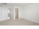 Bedroom with carpet and access to bathroom and closet at 752 Sandy Bar Dr, Winter Garden, FL 34787