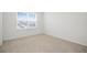 Bright bedroom with carpeted floor and window at 752 Sandy Bar Dr, Winter Garden, FL 34787