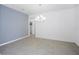 Spacious dining room with chandelier and tile floors at 752 Sandy Bar Dr, Winter Garden, FL 34787