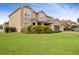 Two-story house with landscaping, two-car garage, and large yard at 752 Sandy Bar Dr, Winter Garden, FL 34787