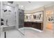Luxurious bathroom with double vanity, large shower, and modern fixtures at 1003 Oakdale St, Windermere, FL 34786