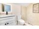 Modern bathroom features a new sink, toilet, and tiled shower at 1003 Oakdale St, Windermere, FL 34786