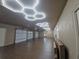 Large garage with epoxy flooring and modern lighting at 1003 Oakdale St, Windermere, FL 34786