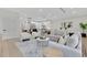 Spacious open concept living room flows into modern kitchen and dining area at 1003 Oakdale St, Windermere, FL 34786