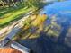 Lake shoreline with clear water at 1003 Oakdale St, Windermere, FL 34786