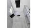 Luxurious shower with ceiling-mounted rain shower head and body jets at 1003 Oakdale St, Windermere, FL 34786