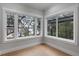 Sunroom showcasing large windows, letting in lots of natural light and views at 1003 Oakdale St, Windermere, FL 34786