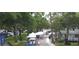 Town Market in shady outdoor area, tents, cars, street at 1003 Oakdale St, Windermere, FL 34786