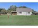 Well maintained exterior of a home with a large front yard at 3260 Se 32Nd Ct, Ocala, FL 34471
