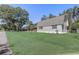 Well maintained exterior of a home with a large front yard at 3260 Se 32Nd Ct, Ocala, FL 34471